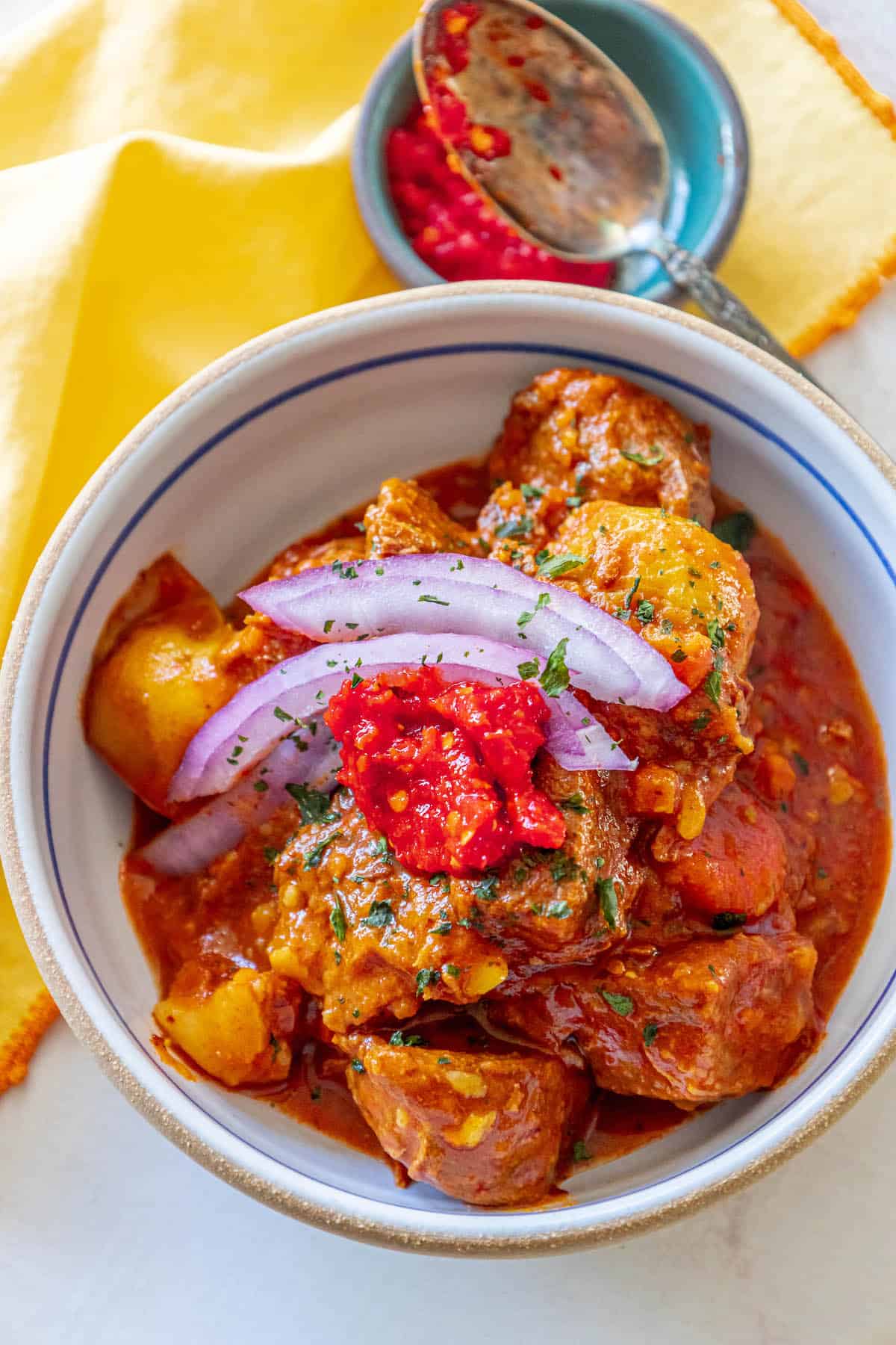 The Best Goulash, an easy and authentic Hungarian beef stew with meat and onions.