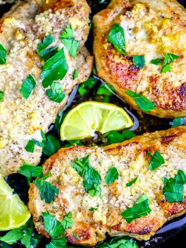 Chicken breasts cooked with lemon and parsley.