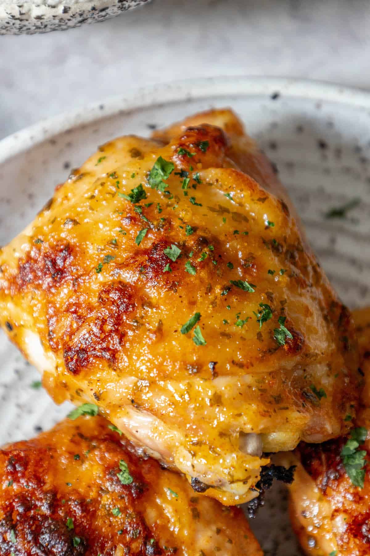 Grilled chicken breasts on a plate with parsley, Baked Ranch Chicken Thighs