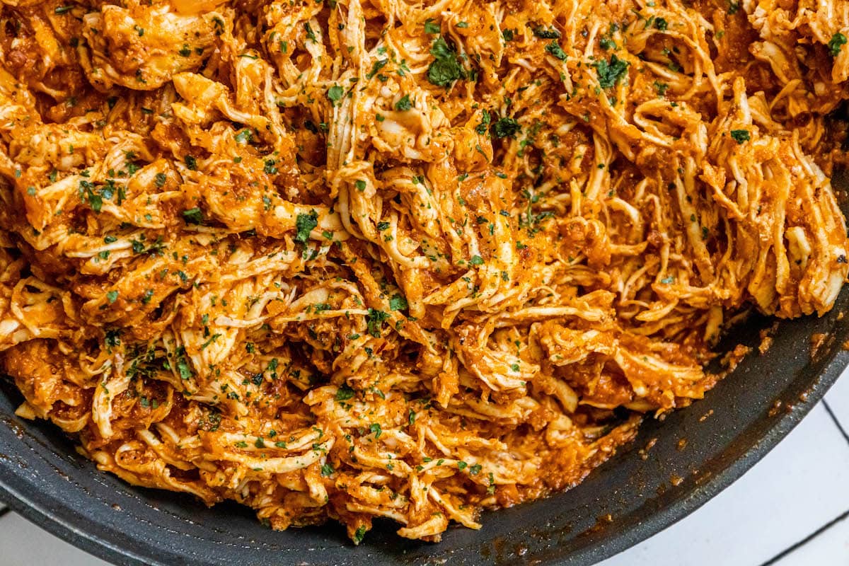 shredded chicken tinga in a pan