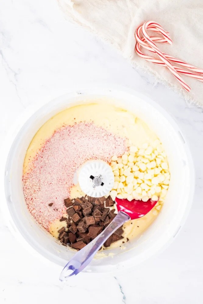 A bowl filled with candy canes and other ingredients.