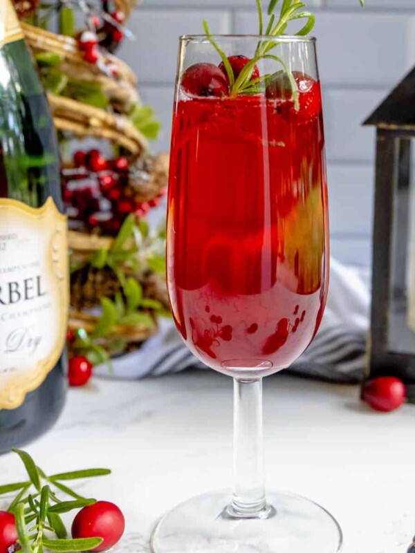 A glass of cranberry champagne sparkler.