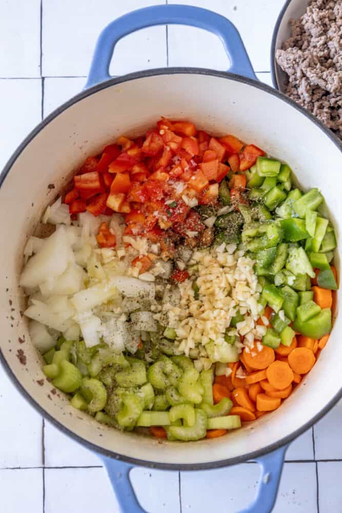 An easy one pot cheeseburger soup recipe with vegetables and meat.