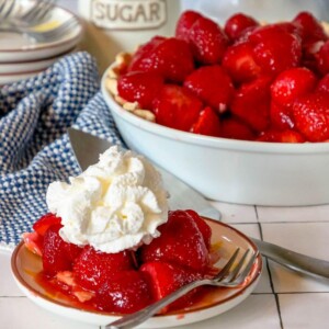 fresh strawberry baked pie in a pie plate