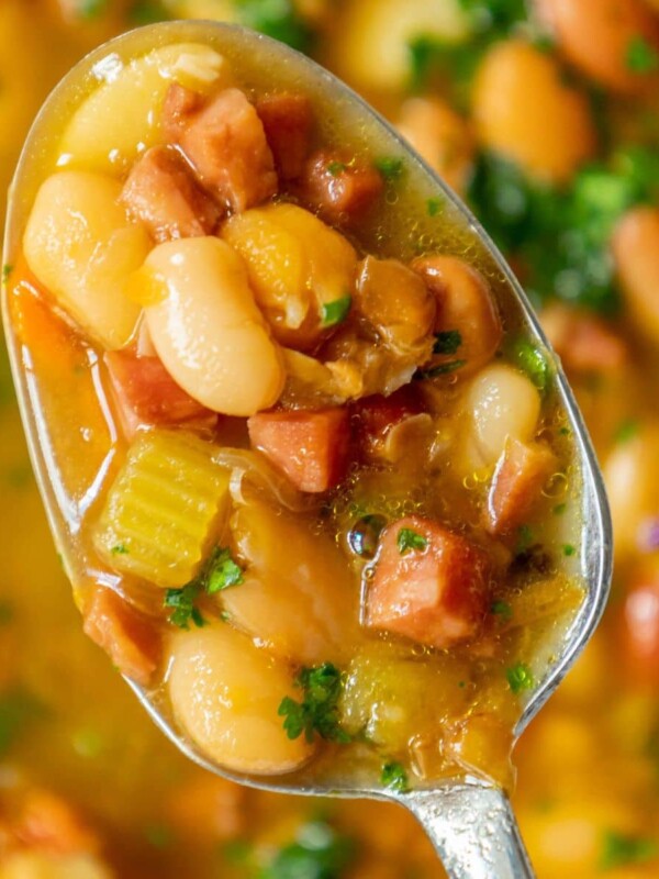 picture of diced ham and bean soup on a spoon