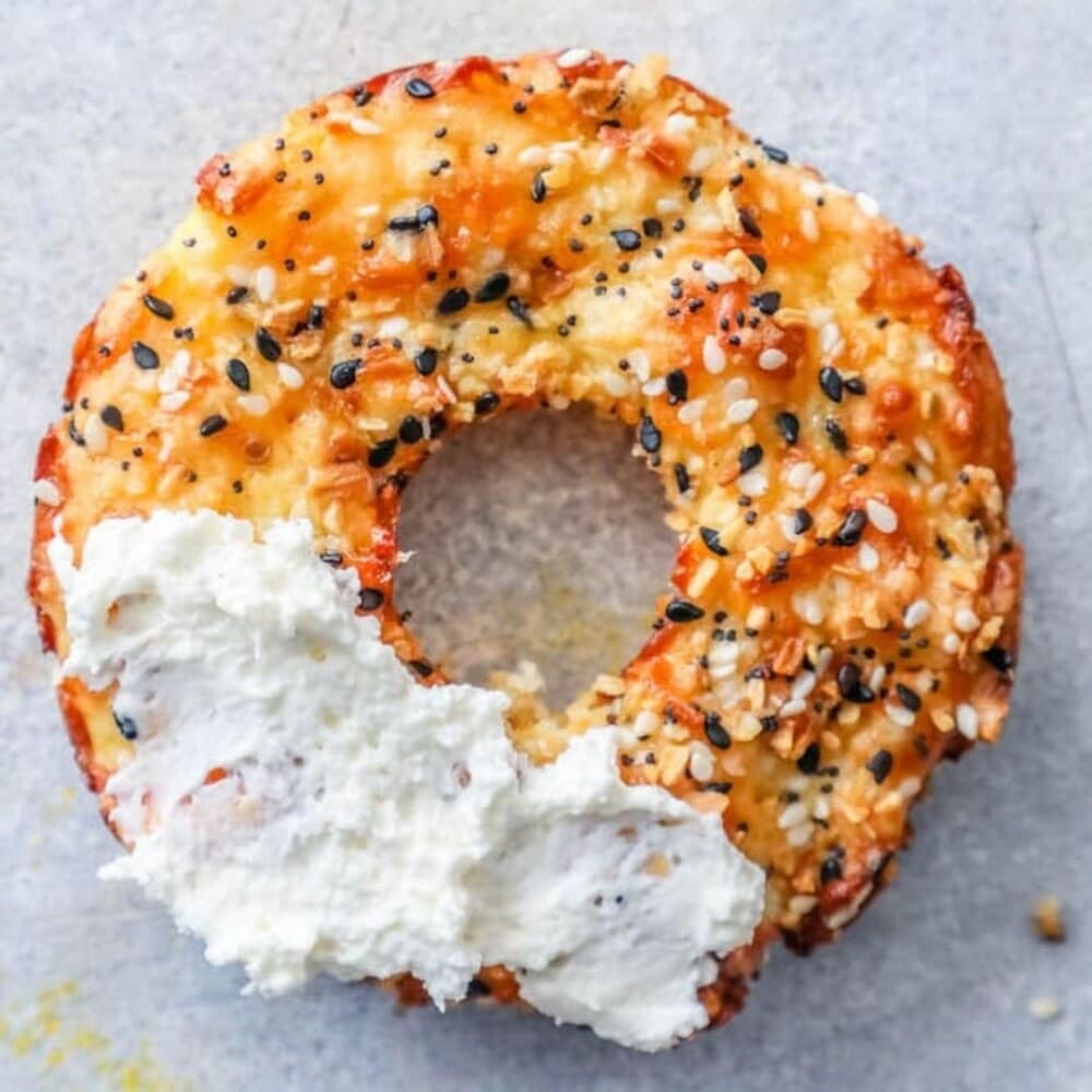 picture of a keto everything bagel with cream cheese on it