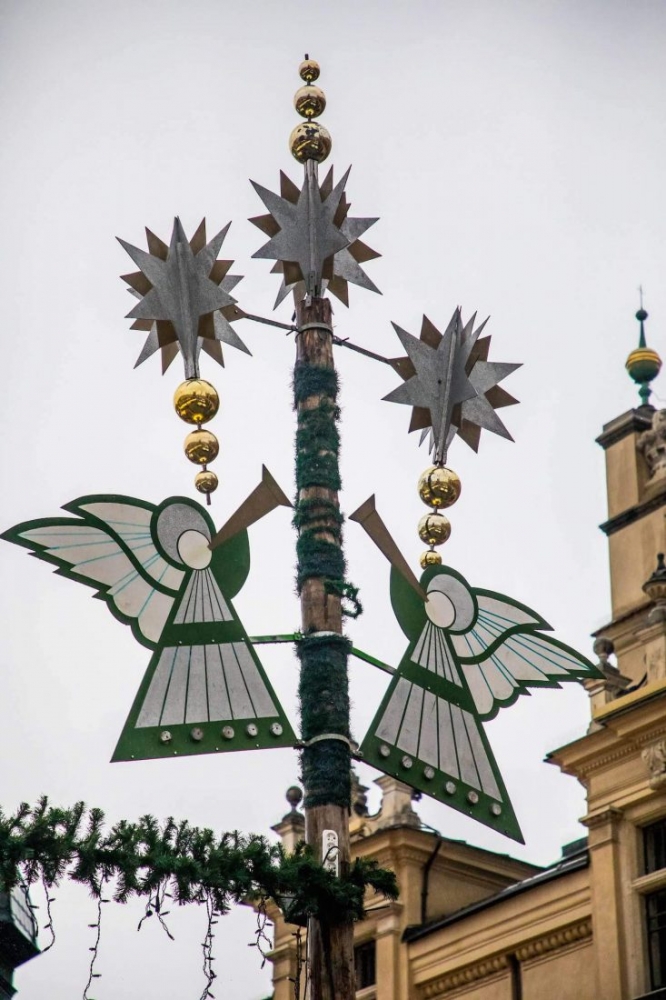 Two angels adorn a Christmas pole at the Krakow Christmas Market.