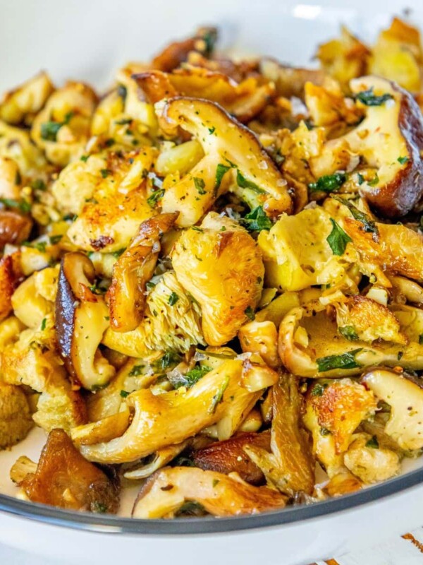 A perfect sautéed mushroom side dish on a table.