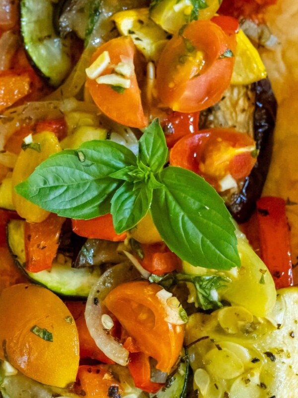 baked tarts with ratatouille on top on a table